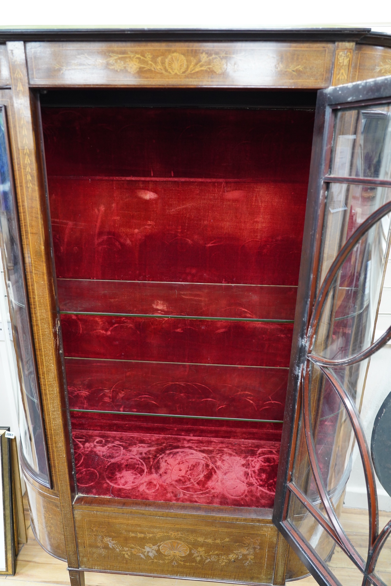 An Edwardian inlaid mahogany display cabinet, width 120cm, depth 39cm, height 169cm. Condition - fair